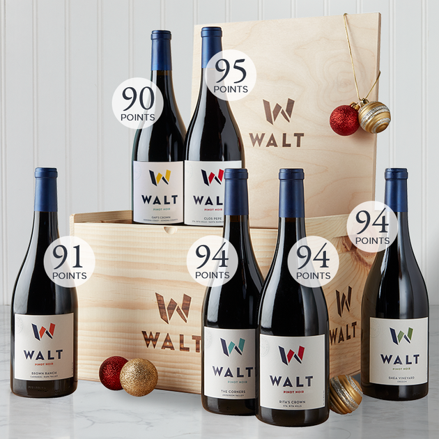 Image of WALT Ultimate Pinot Collector Gift Set featuring six bottles of WALT Pinot Noir and a wooden gift box. 